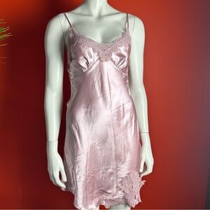 Pink lace slip dress with adjustable straps and a touch of glamour lingerie